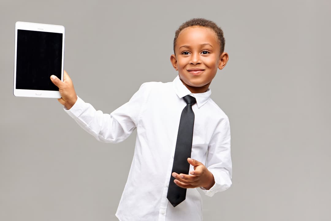 An FET learner working on a tablet